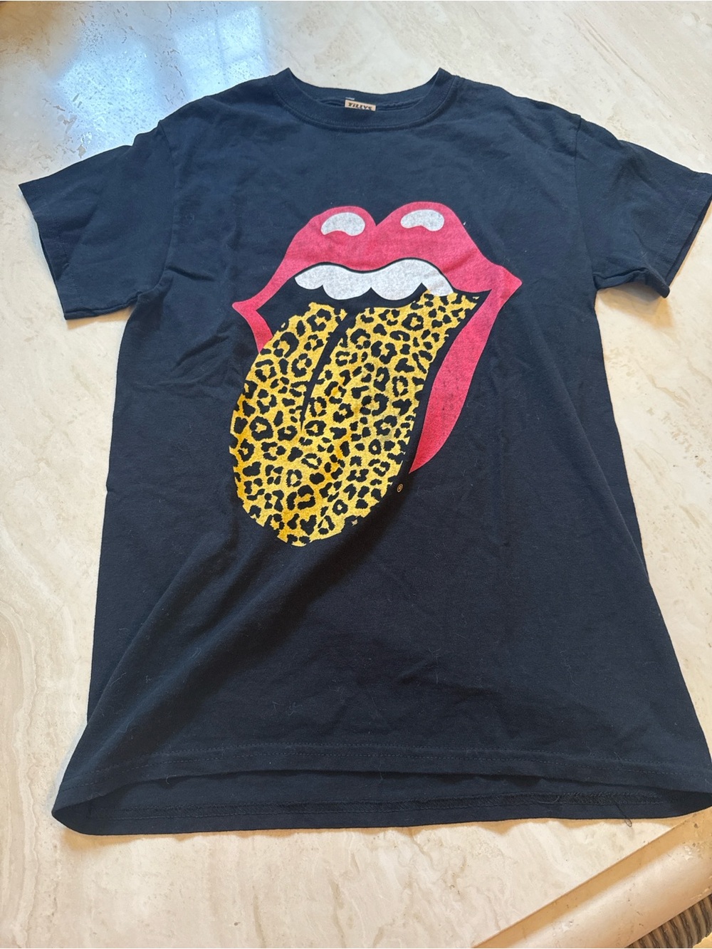 the Rolling Stones Black Tee with Pink Lips and Yellow Leopard Tongue